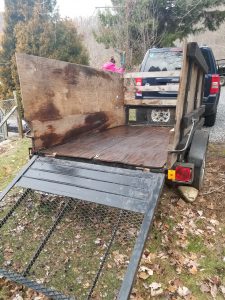 Customer trailer after pickingup old carpet